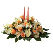 Round centerpiece arrangement with fresh season flowers and fruits