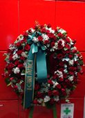 Funeral Wreath with red Roses