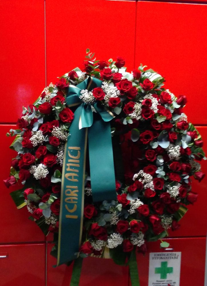 Foto Funeral Wreath with red Roses